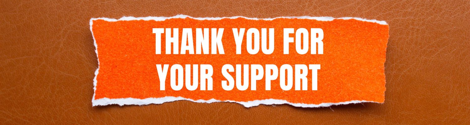 Thank you for your support message written on ripped orange torn paper piece with brown background. Conceptual thank you for your support symbol. Copy space.